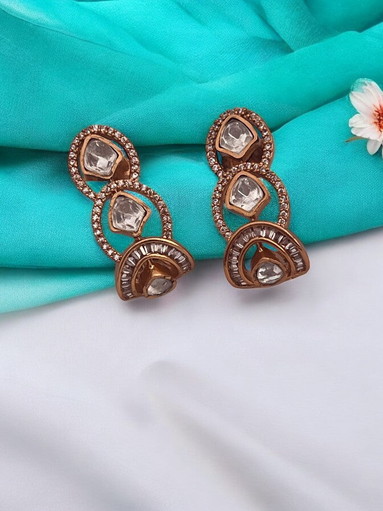 Gold stud earrings